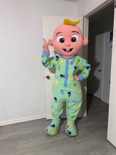 CoComelon JJ character at a birthday party