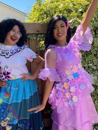 Mirabel and Isabela Encanto characters at a birthday party