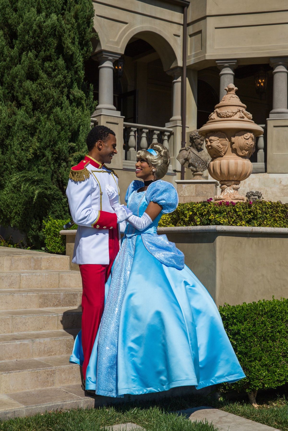 Cinderella and Prince Charming characters at a magical princess birthday party